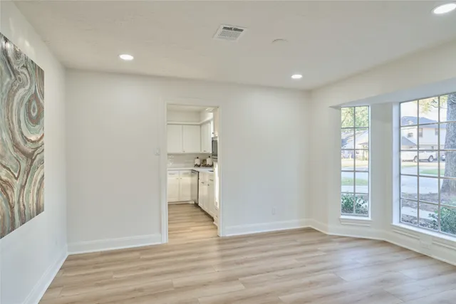 a view of entryway with wooden floor