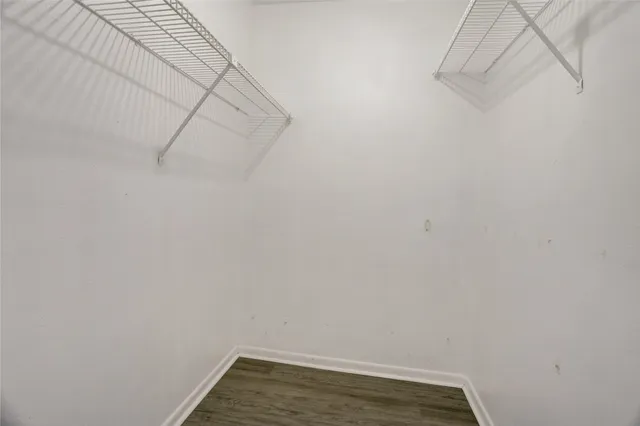 a view of a room with racks on the wall