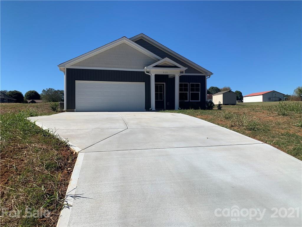 515 3rd Creek Church Road Cleveland, NC 27013 - Photo 1 of 5 a front view of a house with a yard