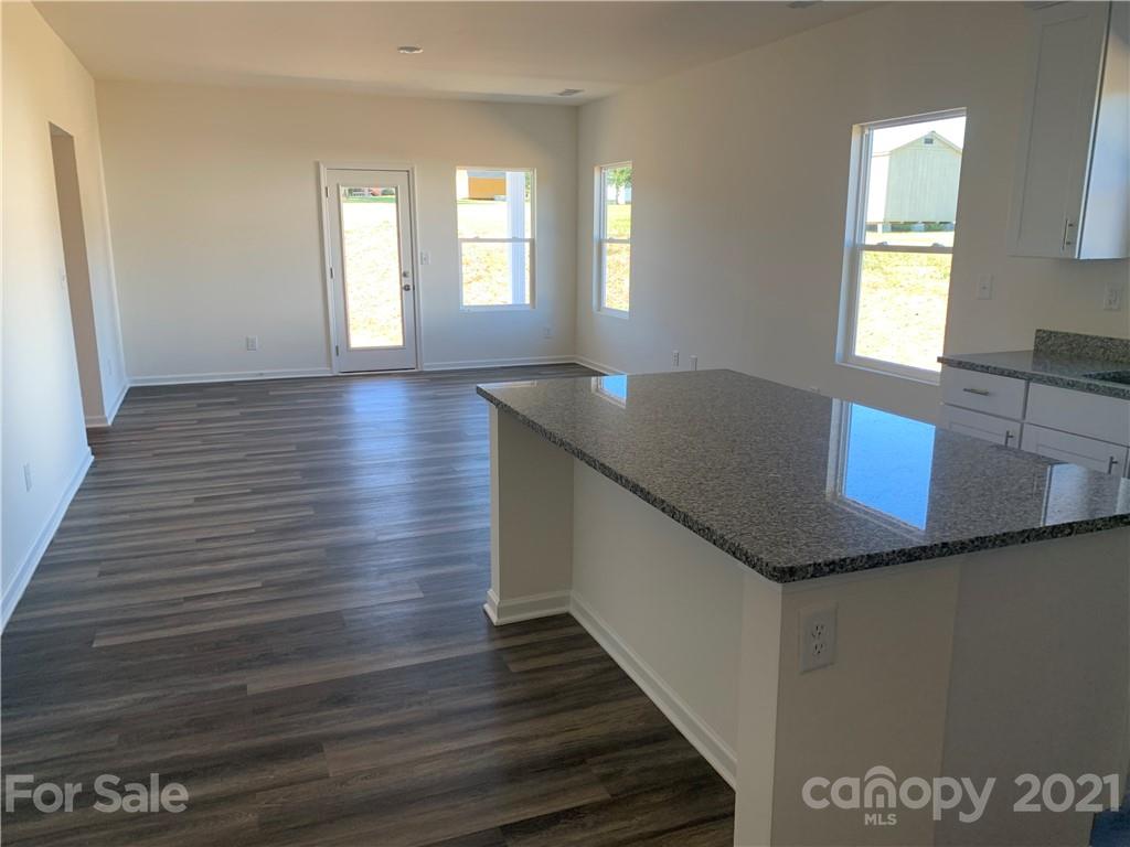 515 3rd Creek Church Road Cleveland, NC 27013 - Photo 2 of 5 a kitchen view with wooden floor and window