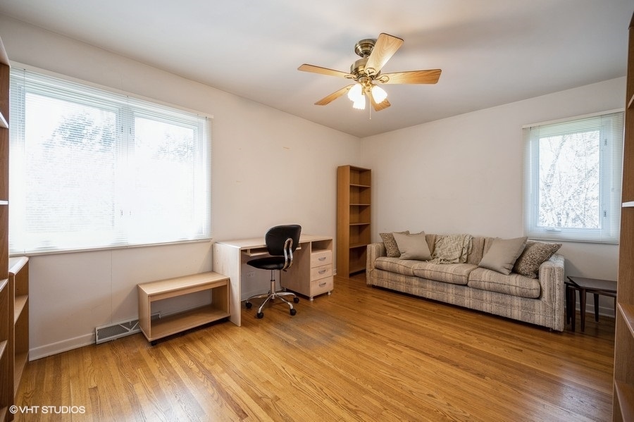 848 Timber Hill Road Highland Park, IL 60035 - Photo 13 of 21 a living room with furniture and a wooden floor