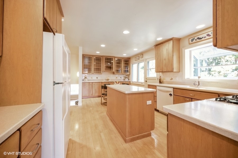 848 Timber Hill Road Highland Park, IL 60035 - Photo 5 of 21 a kitchen with a sink appliances cabinets and a counter top space