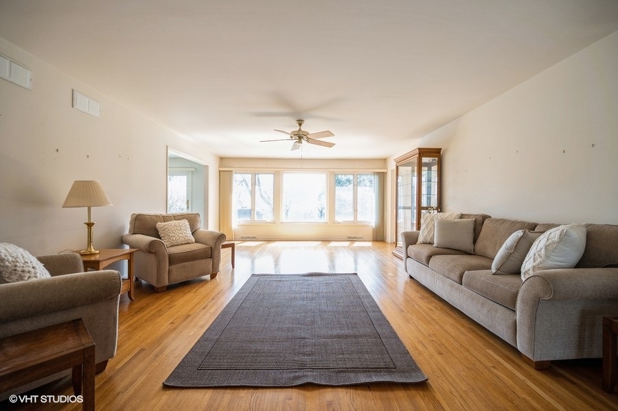 848 Timber Hill Road Highland Park, IL 60035 - Photo 8 of 21 a living room with furniture and a large window