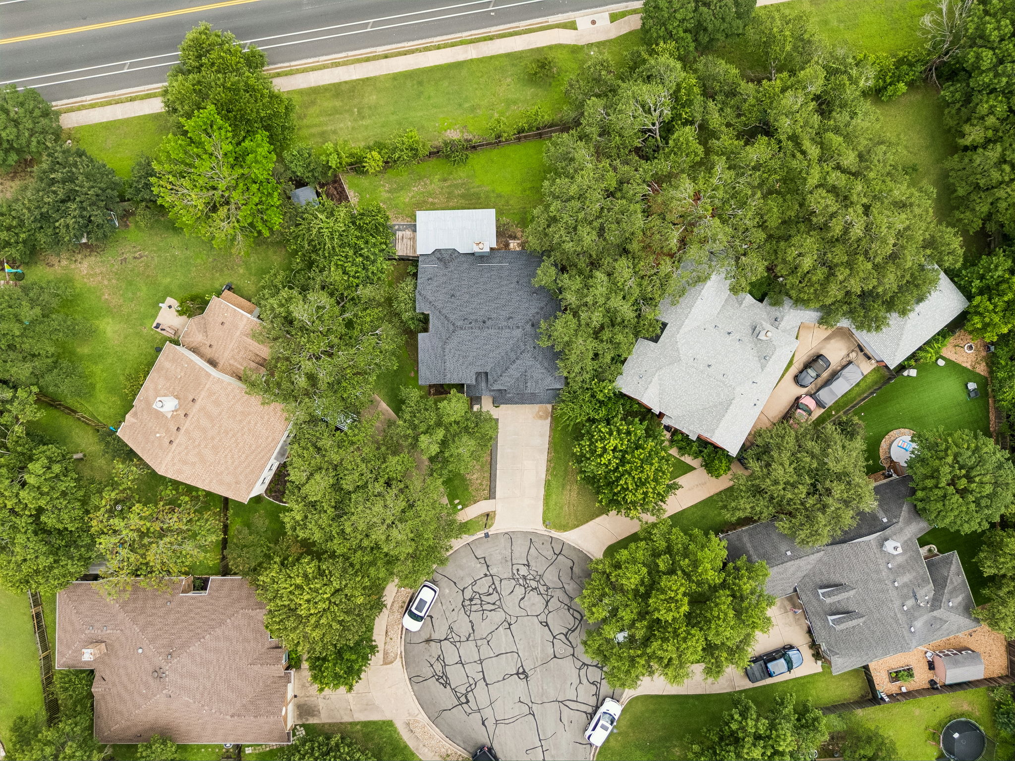 10400 O'Rourk Lane Austin, TX 78739 - Photo 28 of 33 an aerial view of a house with a yard basket ball court and outdoor seating