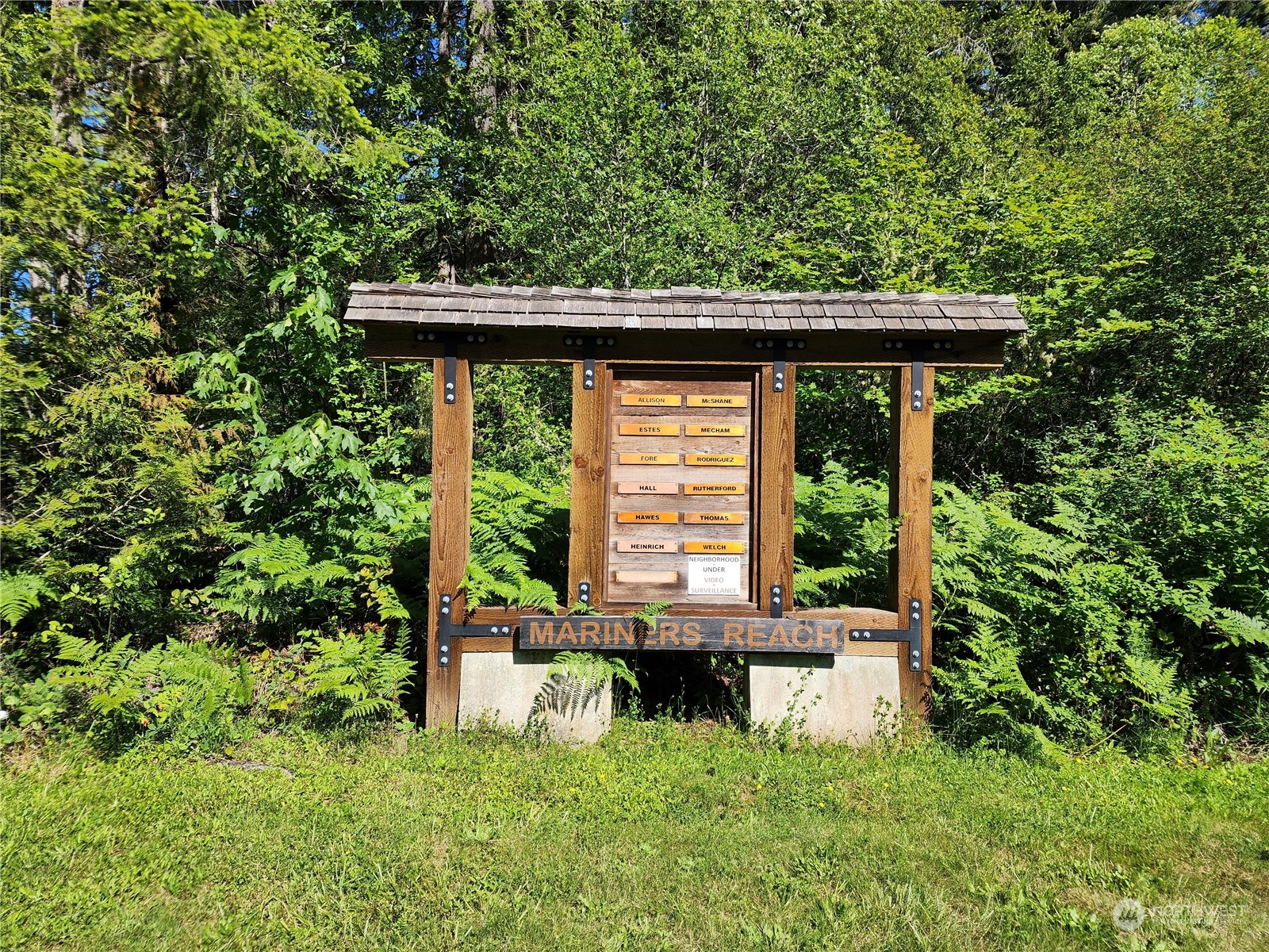 161 East Geist Point Road Shelton, WA 98584 - Photo 14 of 14 a backyard of a house with table and chairs