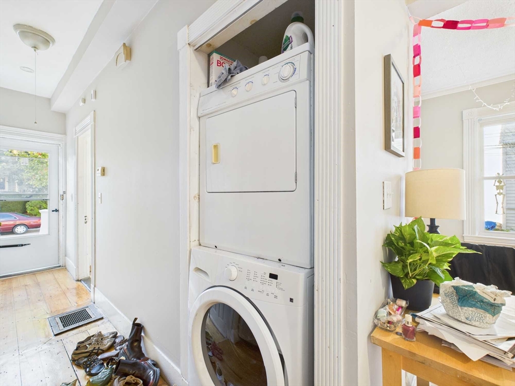 16-22 Reedsdale Street Boston, MA 02134 - Photo 38 of 39 a view of washer and dryer with bathroom in the background