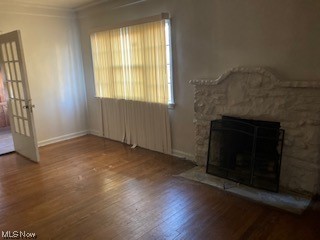 1508 Genesee Road South Euclid, OH 44121 - Photo 5 of 12 Hardwood floored living room with crown molding and a fireplace