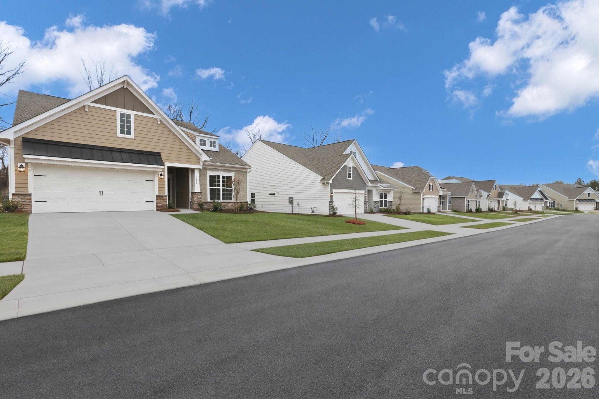 5450 Redbud Road, Unit 66 Lancaster, SC 29720 - Photo 2 of 35 a view of a house with a big yard