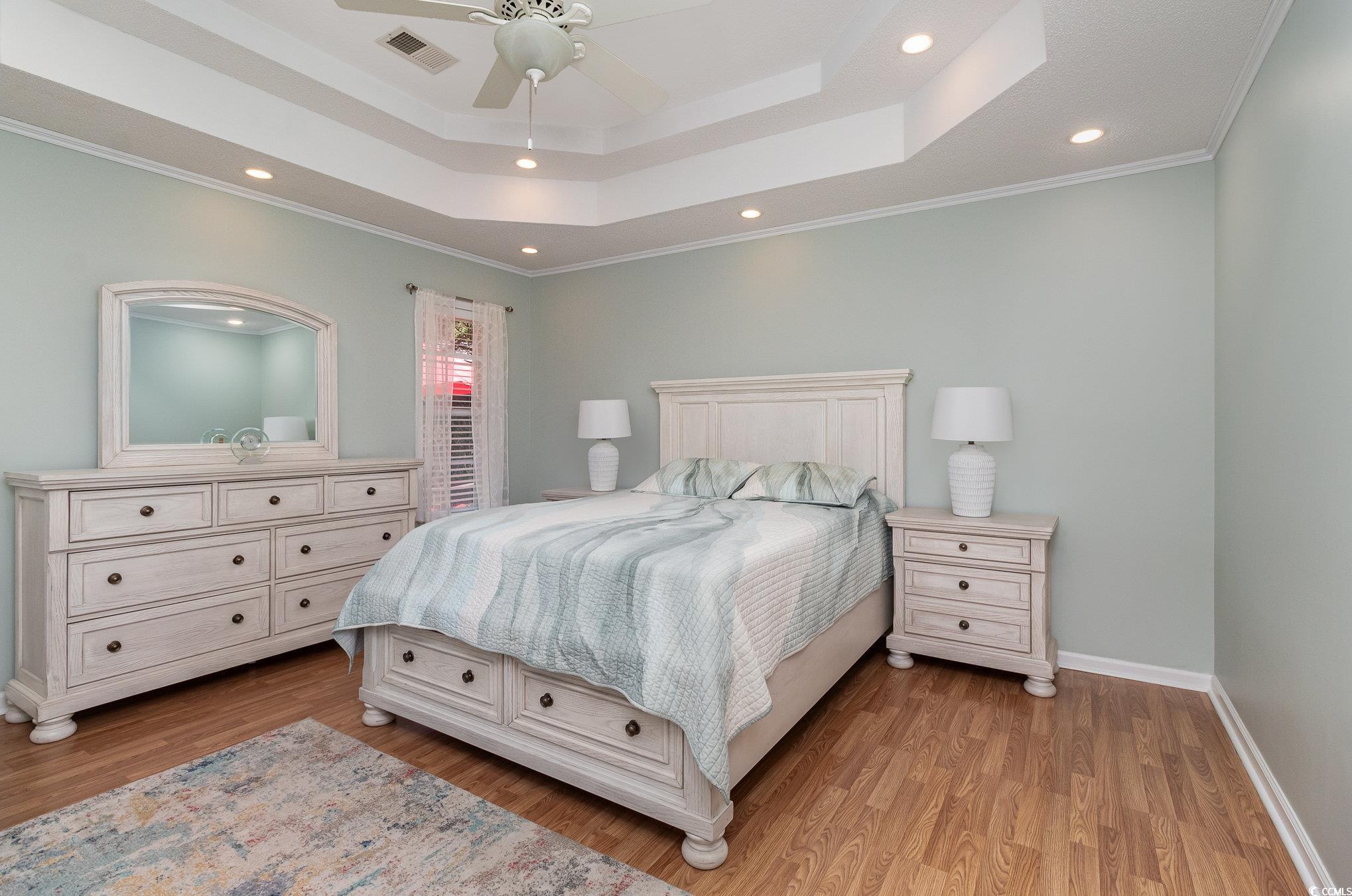 2654 Wild Game Trail Myrtle Beach, SC 29588 - Photo 13 of 37 Bedroom with recessed lighting, crown molding, vis