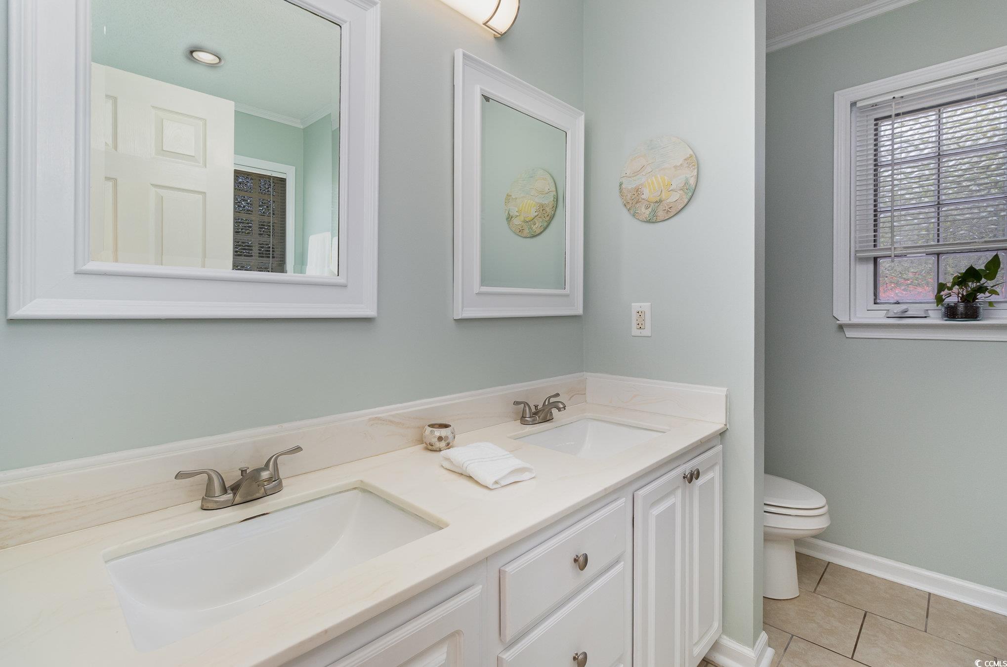 2654 Wild Game Trail Myrtle Beach, SC 29588 - Photo 17 of 37 Bathroom featuring tile patterned flooring, a sink