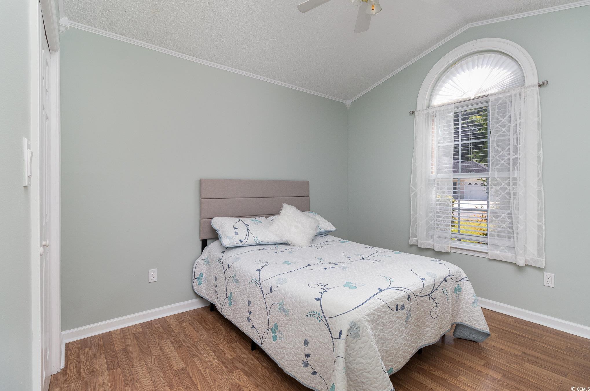 2654 Wild Game Trail Myrtle Beach, SC 29588 - Photo 20 of 37 Bedroom with wood finished floors, baseboards, and