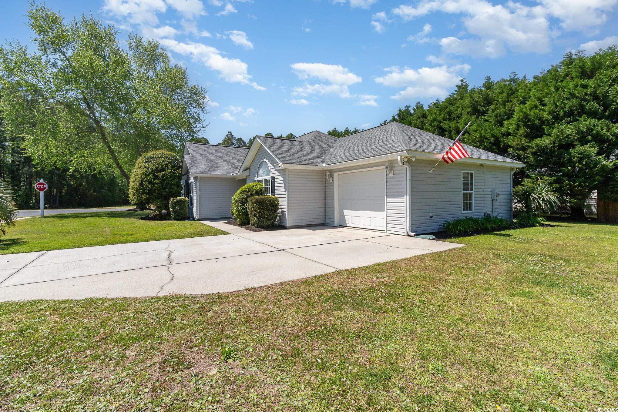 2654 Wild Game Trail Myrtle Beach, SC 29588 - Photo 3 of 37 View of front of house with an attached garage, a