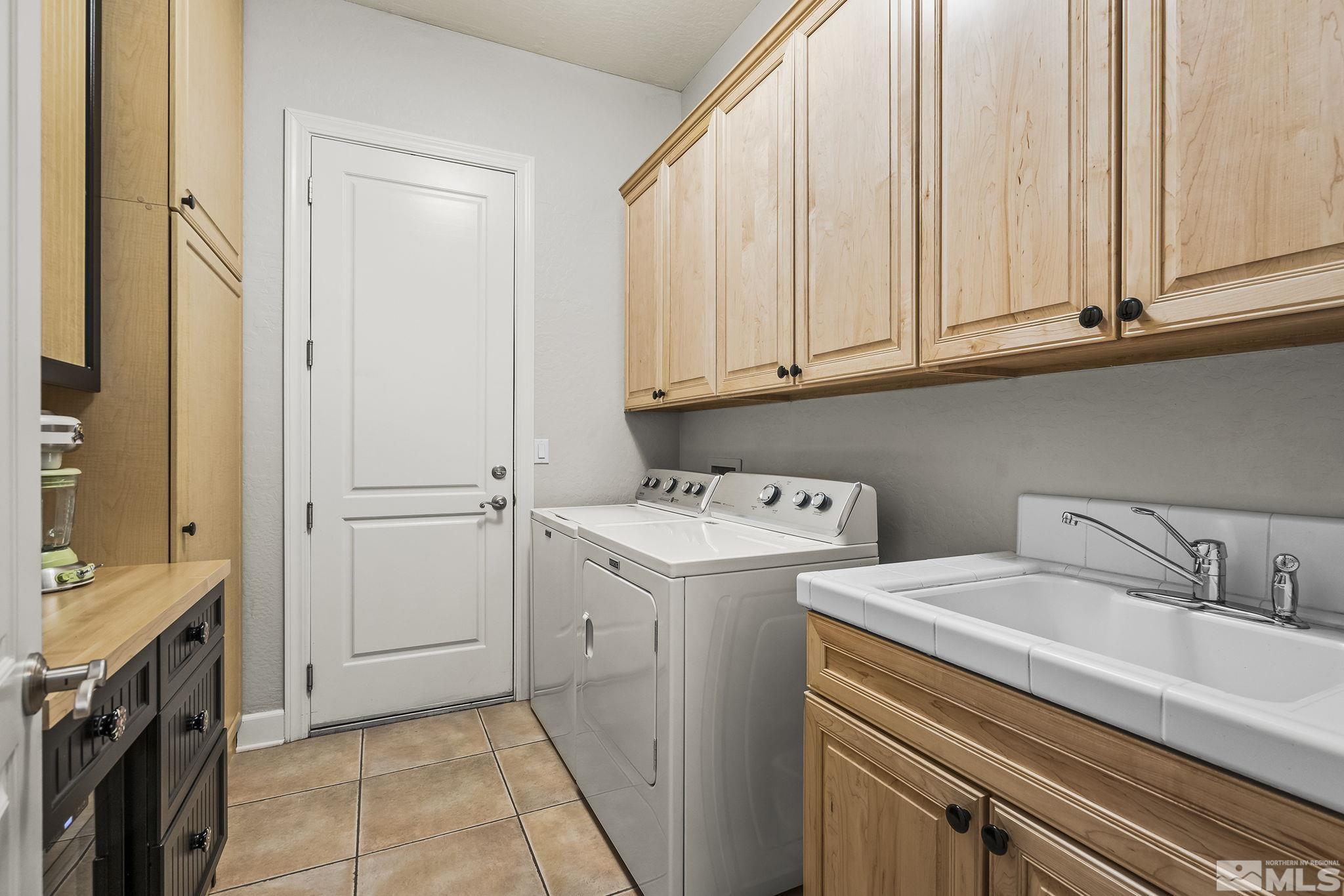 1465 Meridian Ranch Drive Reno, NV 89523 - Photo 24 of 40 a utility room with dryer and washer