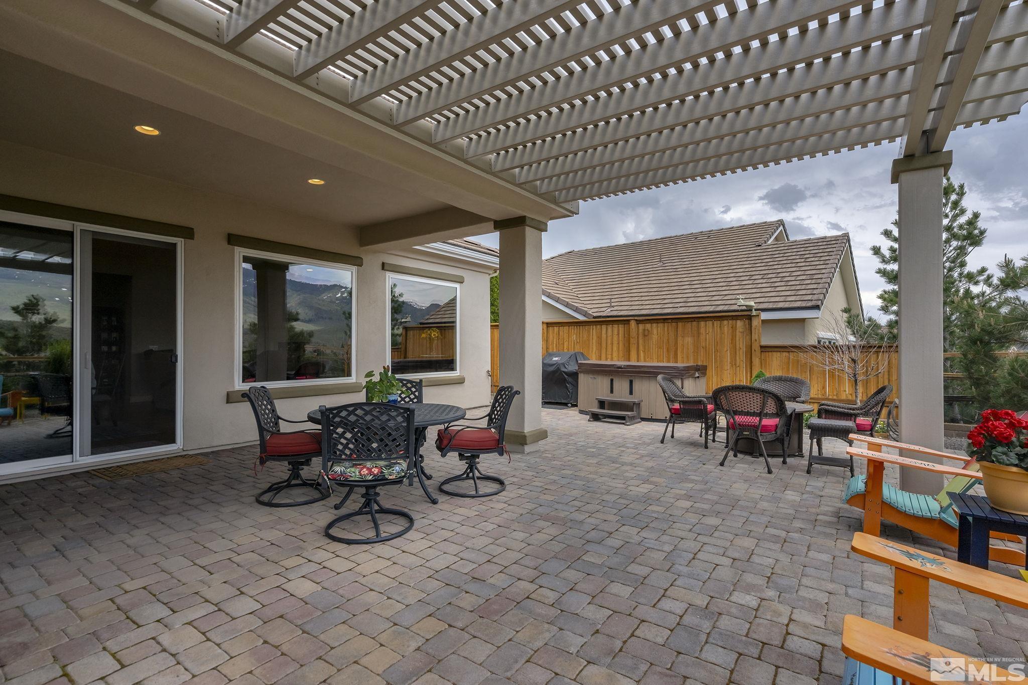 1465 Meridian Ranch Drive Reno, NV 89523 - Photo 27 of 40 a view of a patio with table and chairs
