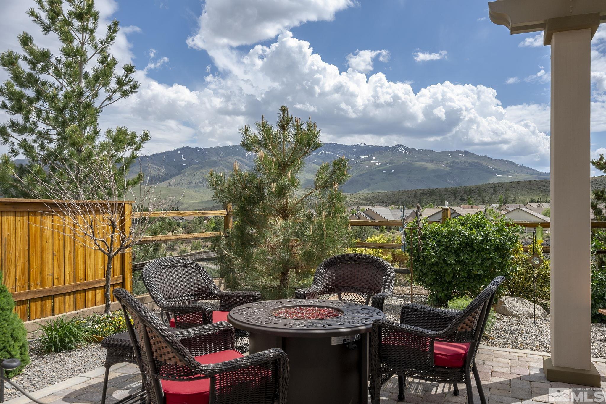 1465 Meridian Ranch Drive Reno, NV 89523 - Photo 29 of 40 a view of a patio with table and chairs and potted plants