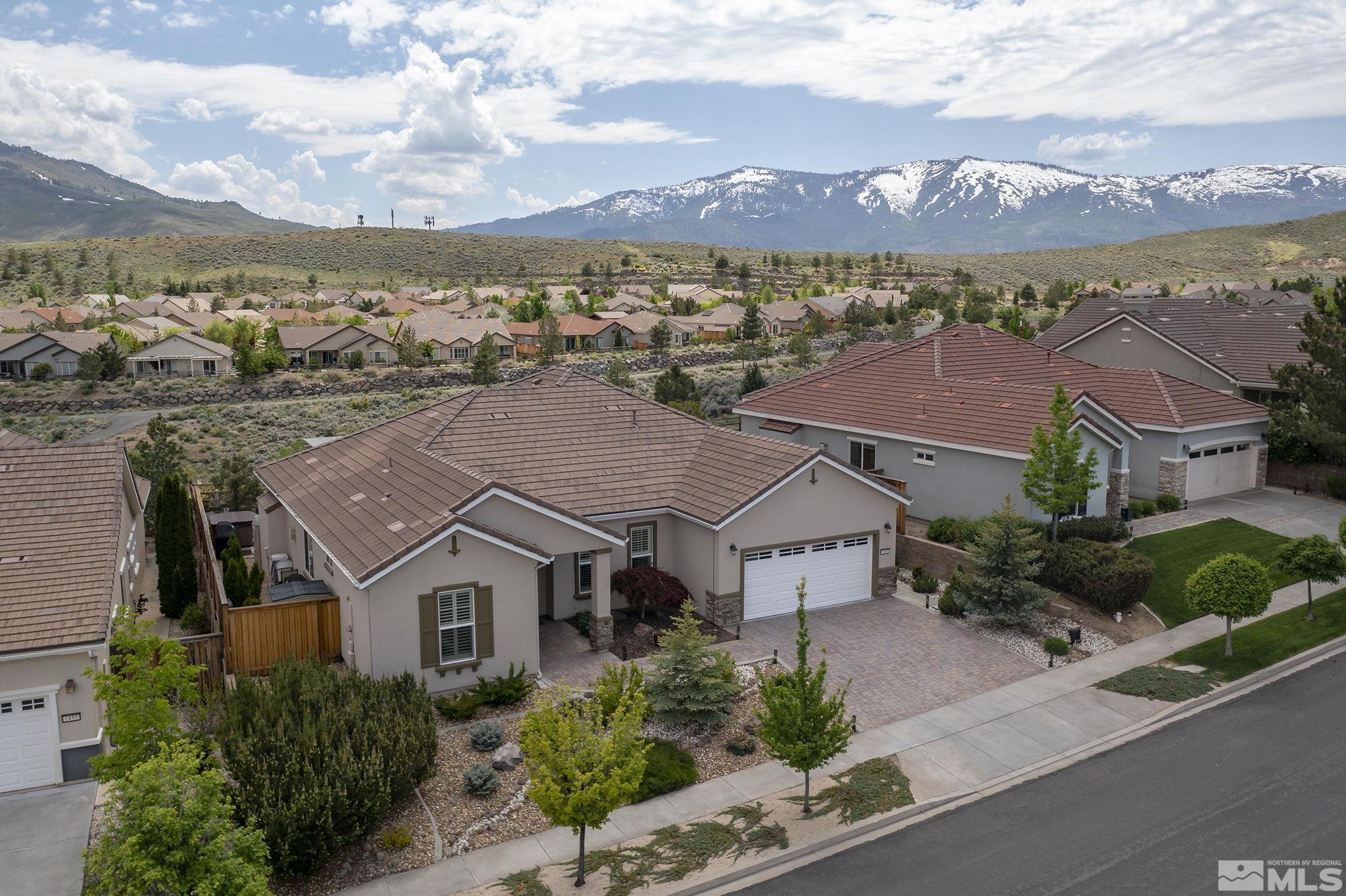 1465 Meridian Ranch Drive Reno, NV 89523 - Photo 31 of 40 an aerial view of residential houses with a city view