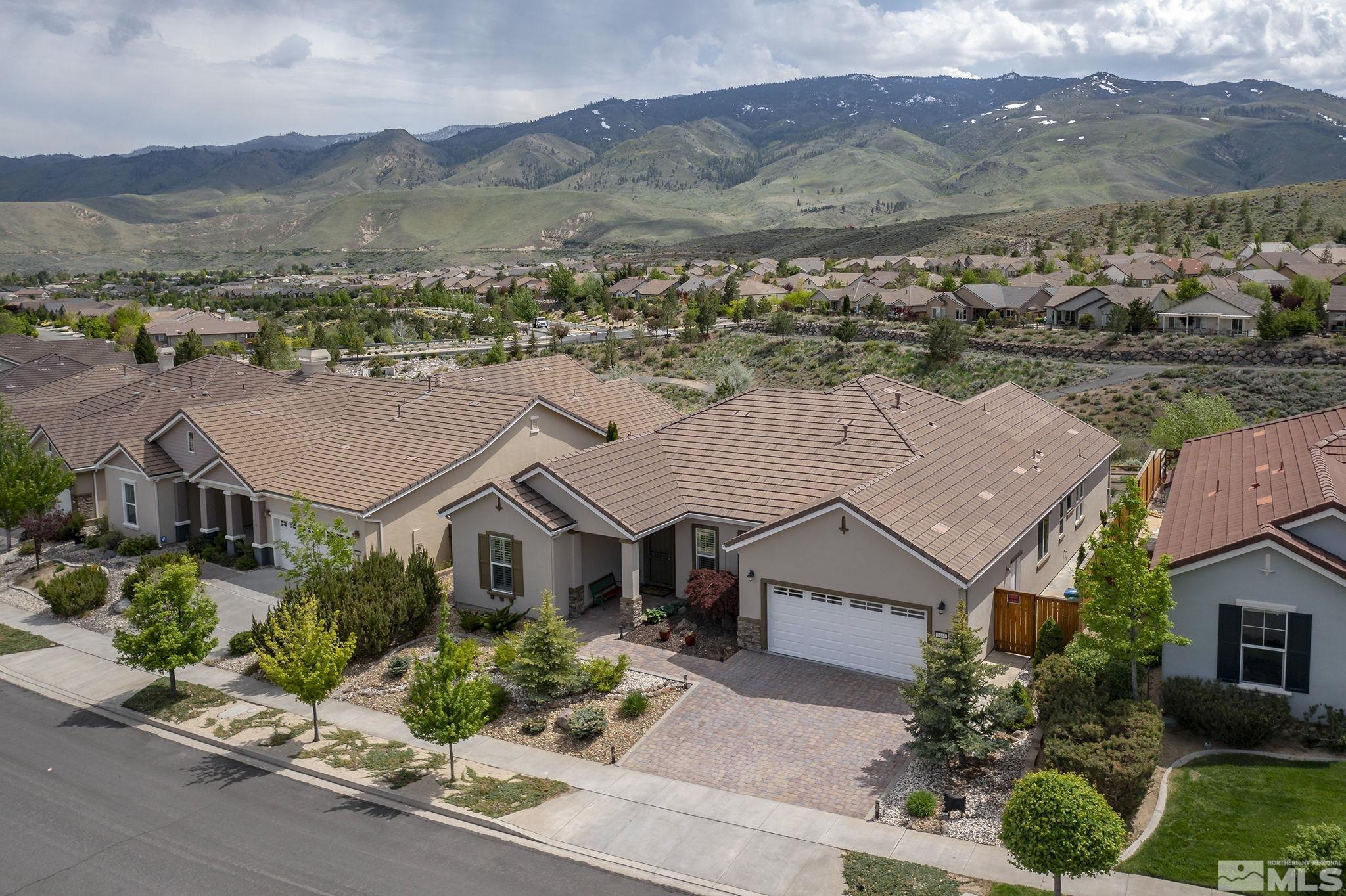 1465 Meridian Ranch Drive Reno, NV 89523 - Photo 32 of 40 an aerial view of houses with a street