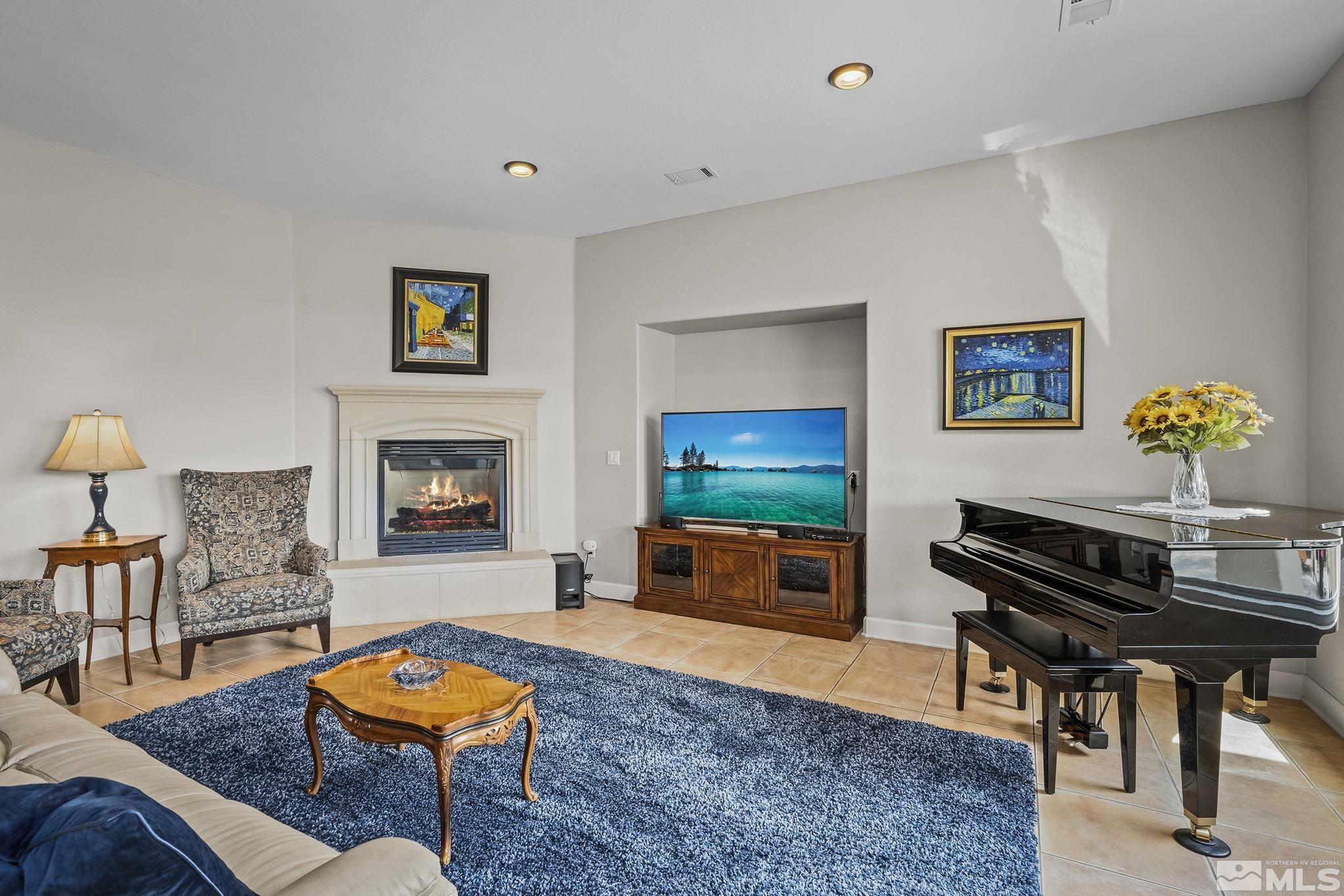 1465 Meridian Ranch Drive Reno, NV 89523 - Photo 5 of 40 a living room with furniture and a flat screen tv