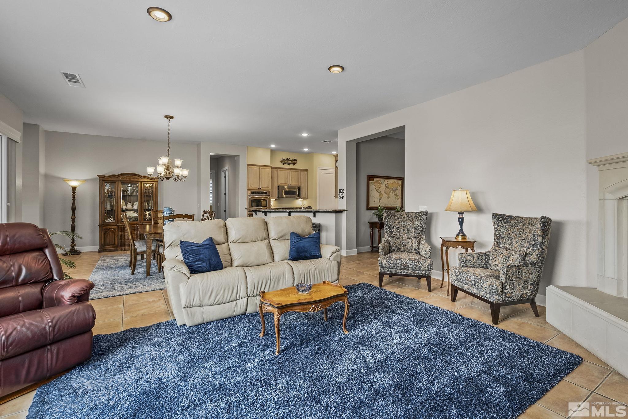 1465 Meridian Ranch Drive Reno, NV 89523 - Photo 6 of 40 a living room with furniture and wooden floor
