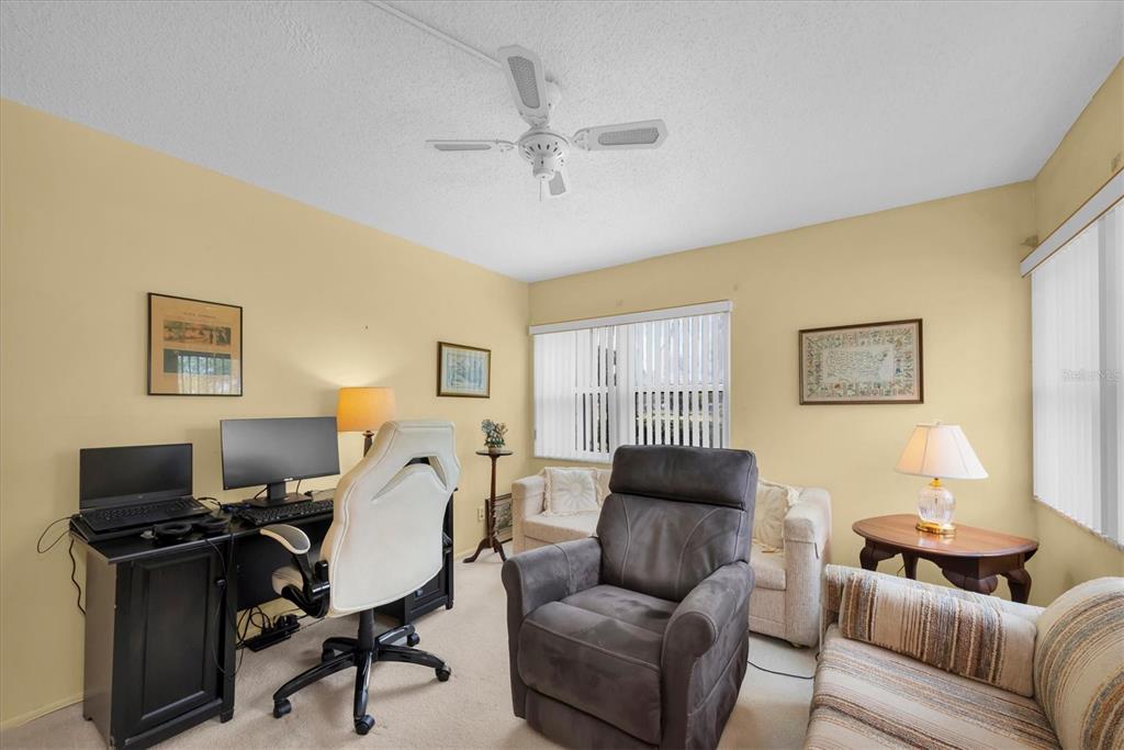 12300 Vonn Road, Unit 4101 Largo, FL 33774 - Photo 29 of 46 a living room with furniture and a window