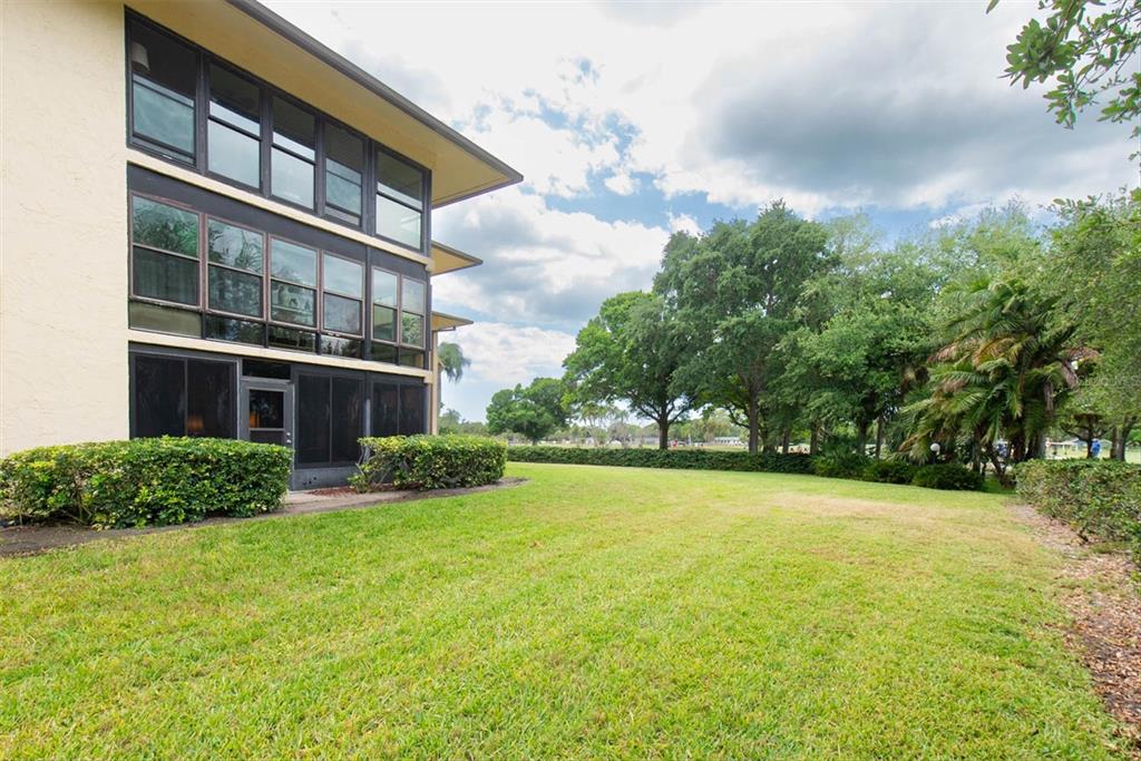 12300 Vonn Road, Unit 4101 Largo, FL 33774 - Photo 39 of 46 a view of a house with a yard and plants