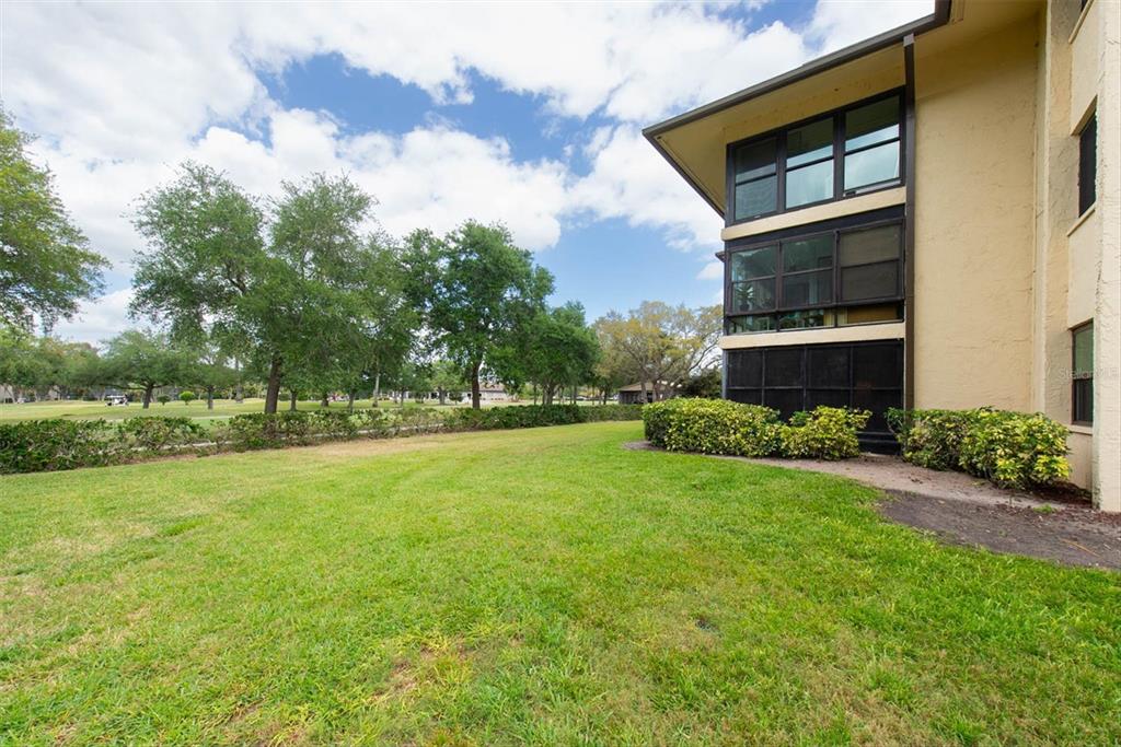 12300 Vonn Road, Unit 4101 Largo, FL 33774 - Photo 42 of 46 a view of a house with backyard and garden
