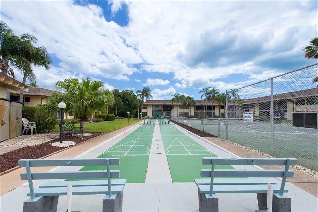 12300 Vonn Road, Unit 4101 Largo, FL 33774 - Photo 44 of 46 a view of a patio with swimming pool