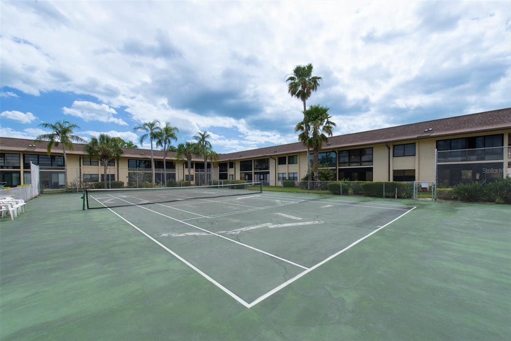 12300 Vonn Road, Unit 4101 Largo, FL 33774 - Photo 46 of 46 a front view of a building with a garden