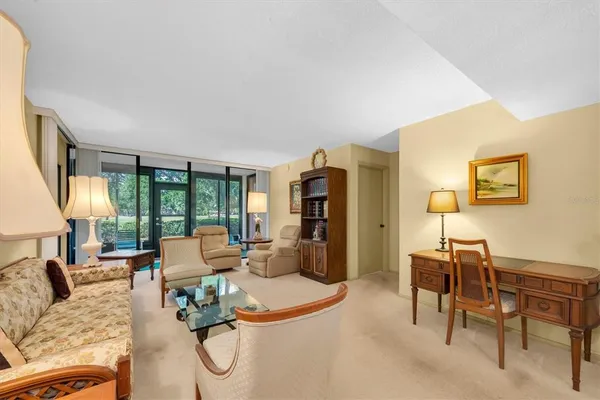 a dining room with a table and chairs