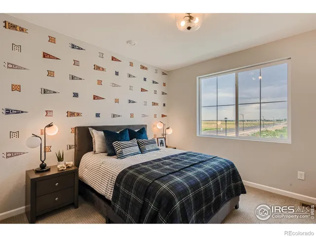 a view of room with furniture and wooden floor