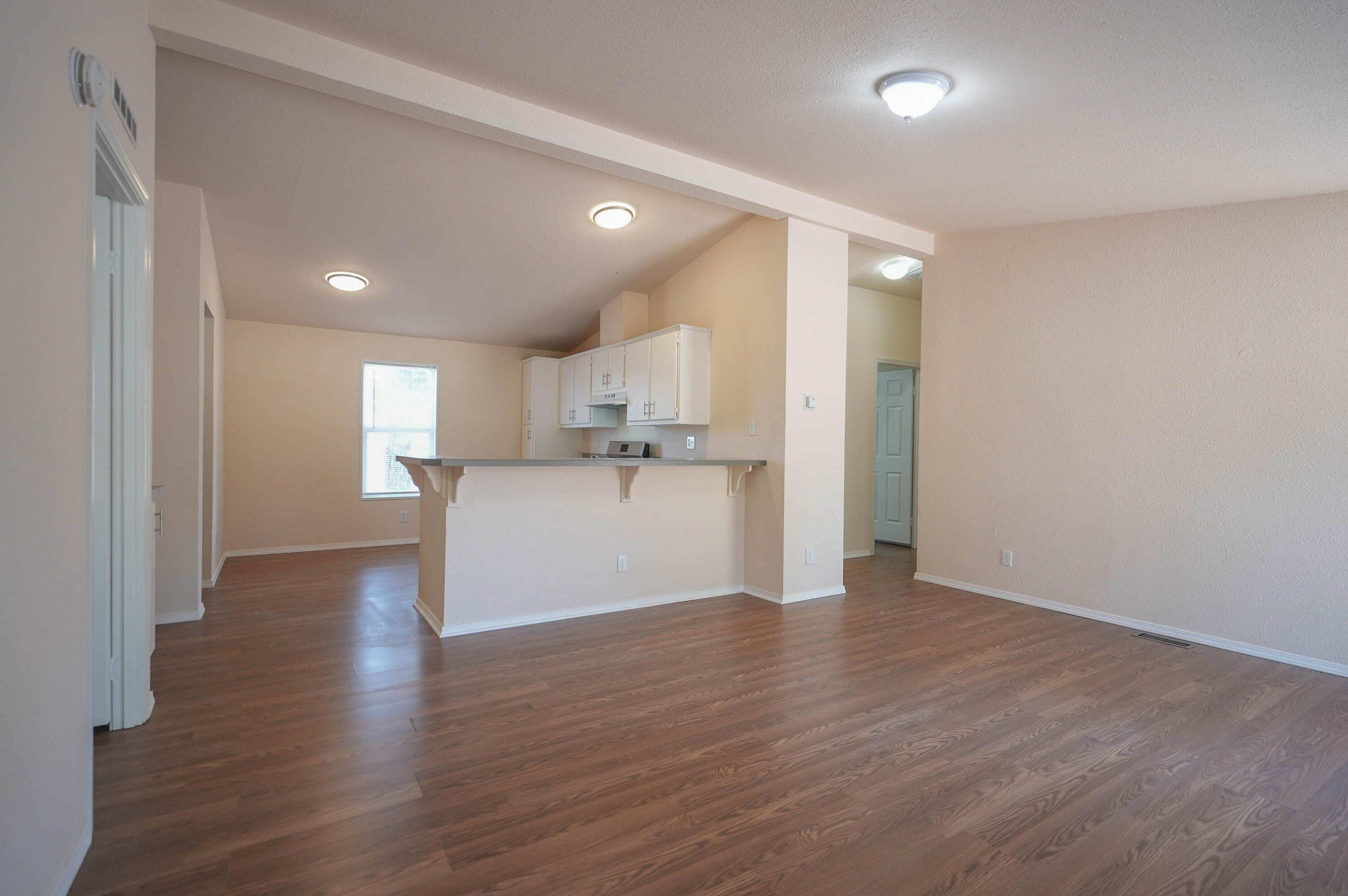 25016 Drews Road Chiloquin, OR 97624 - Photo 13 of 54 a view of a kitchen with a refrigerator and wooden floor