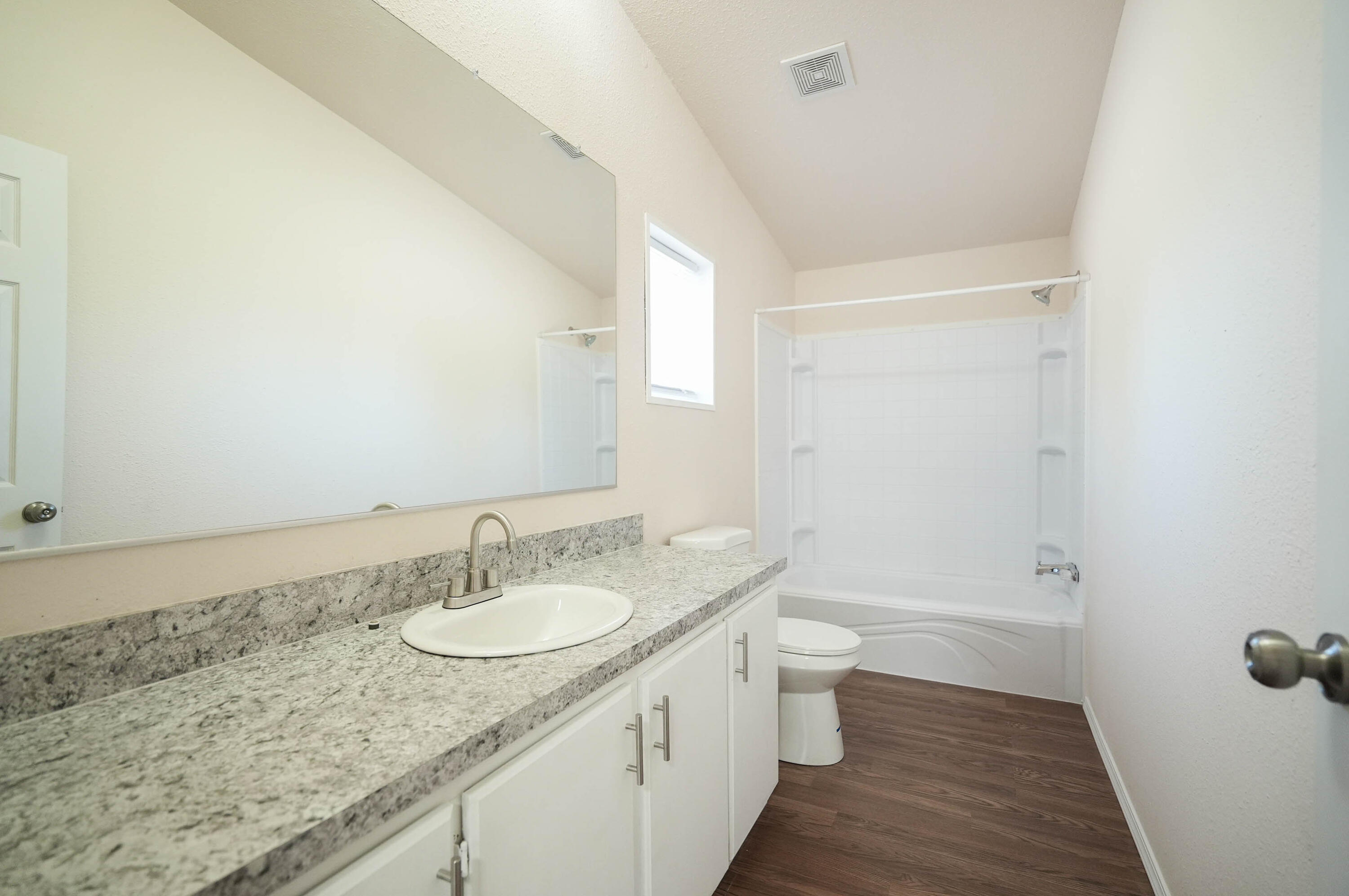 25016 Drews Road Chiloquin, OR 97624 - Photo 25 of 54 a bathroom with a granite countertop sink a toilet and shower