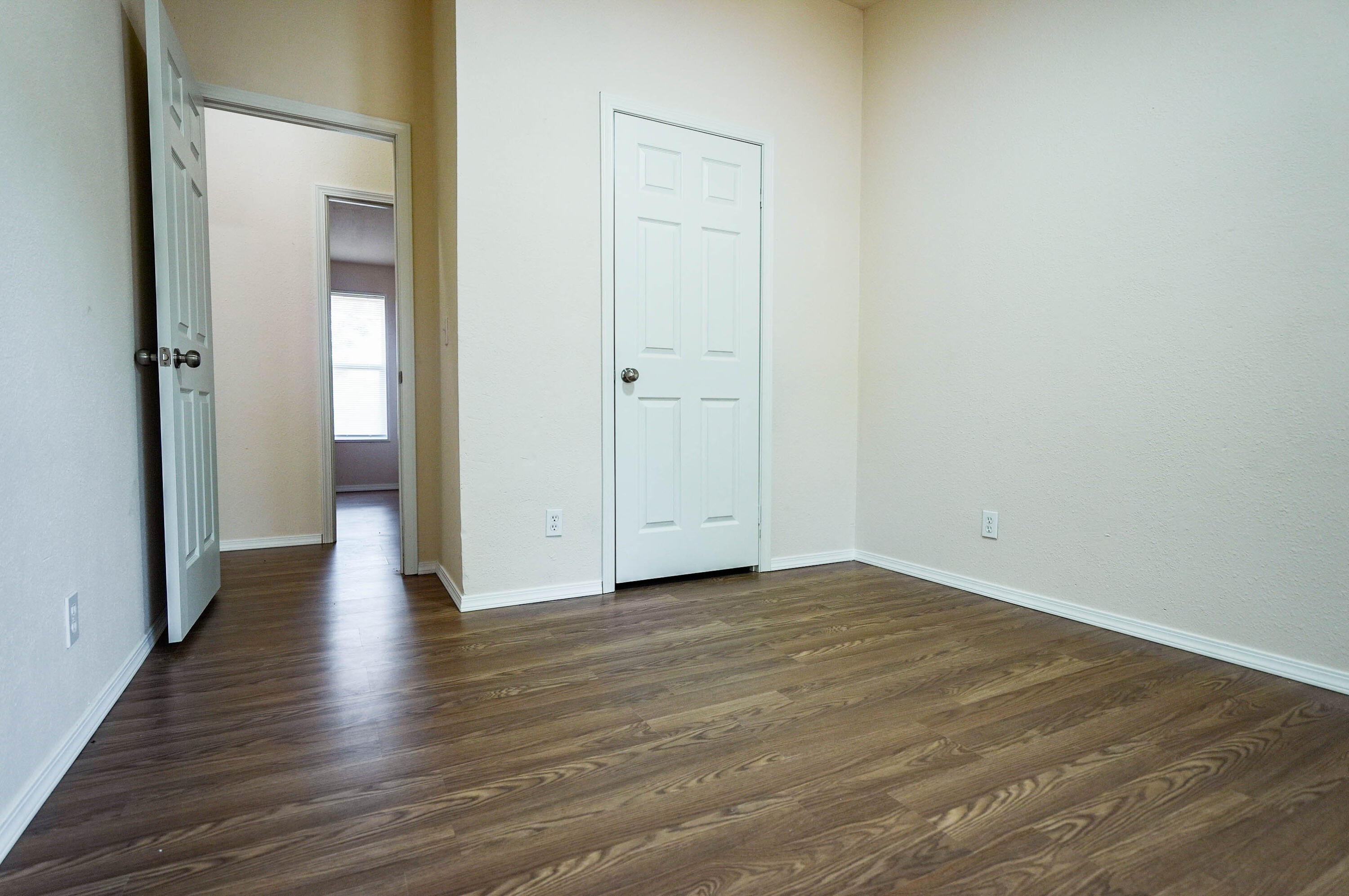 25016 Drews Road Chiloquin, OR 97624 - Photo 35 of 54 a view of an empty room with wooden floor and a mirror