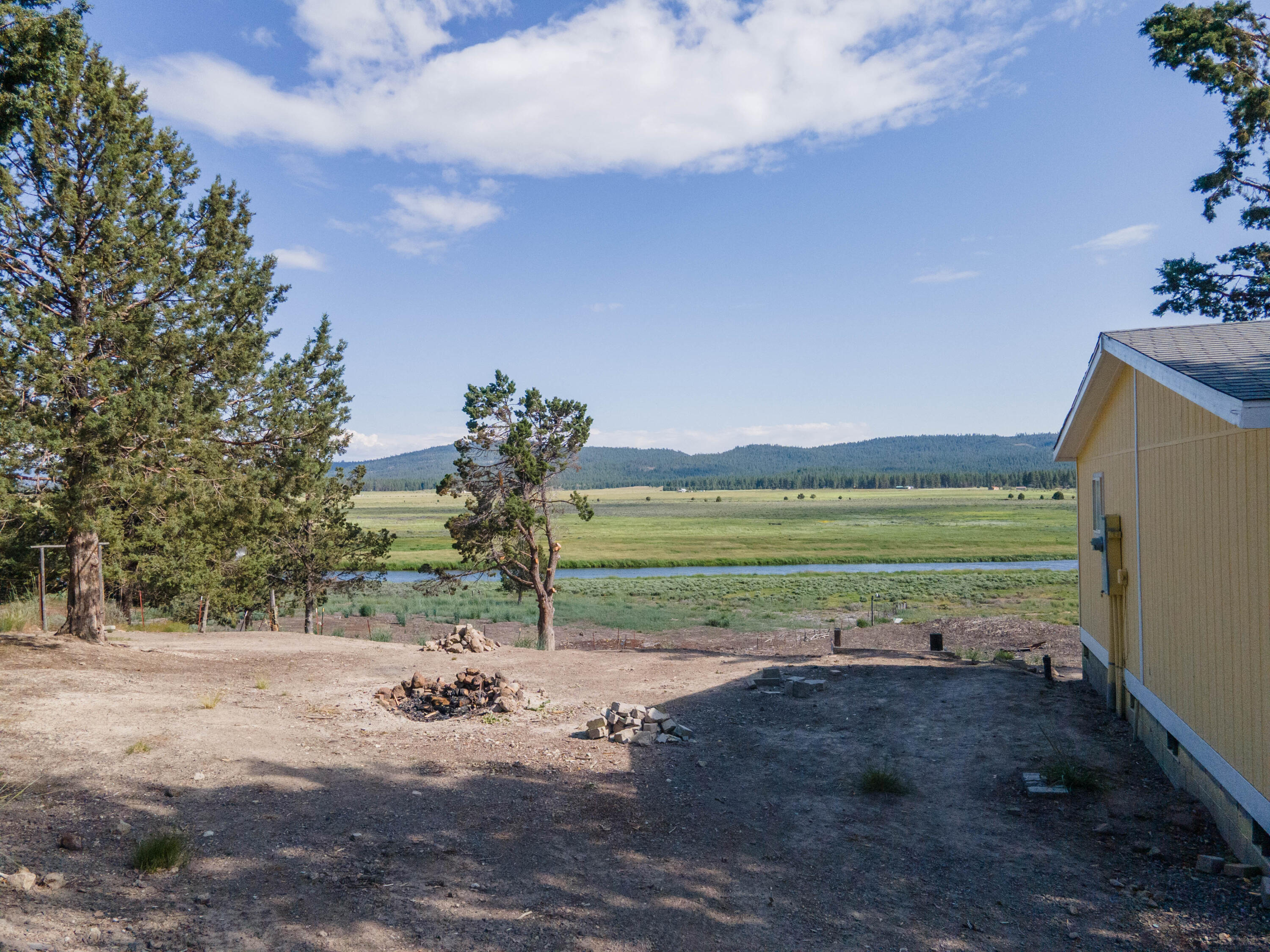 25016 Drews Road Chiloquin, OR 97624 - Photo 40 of 54 a view of a lake with a big yard