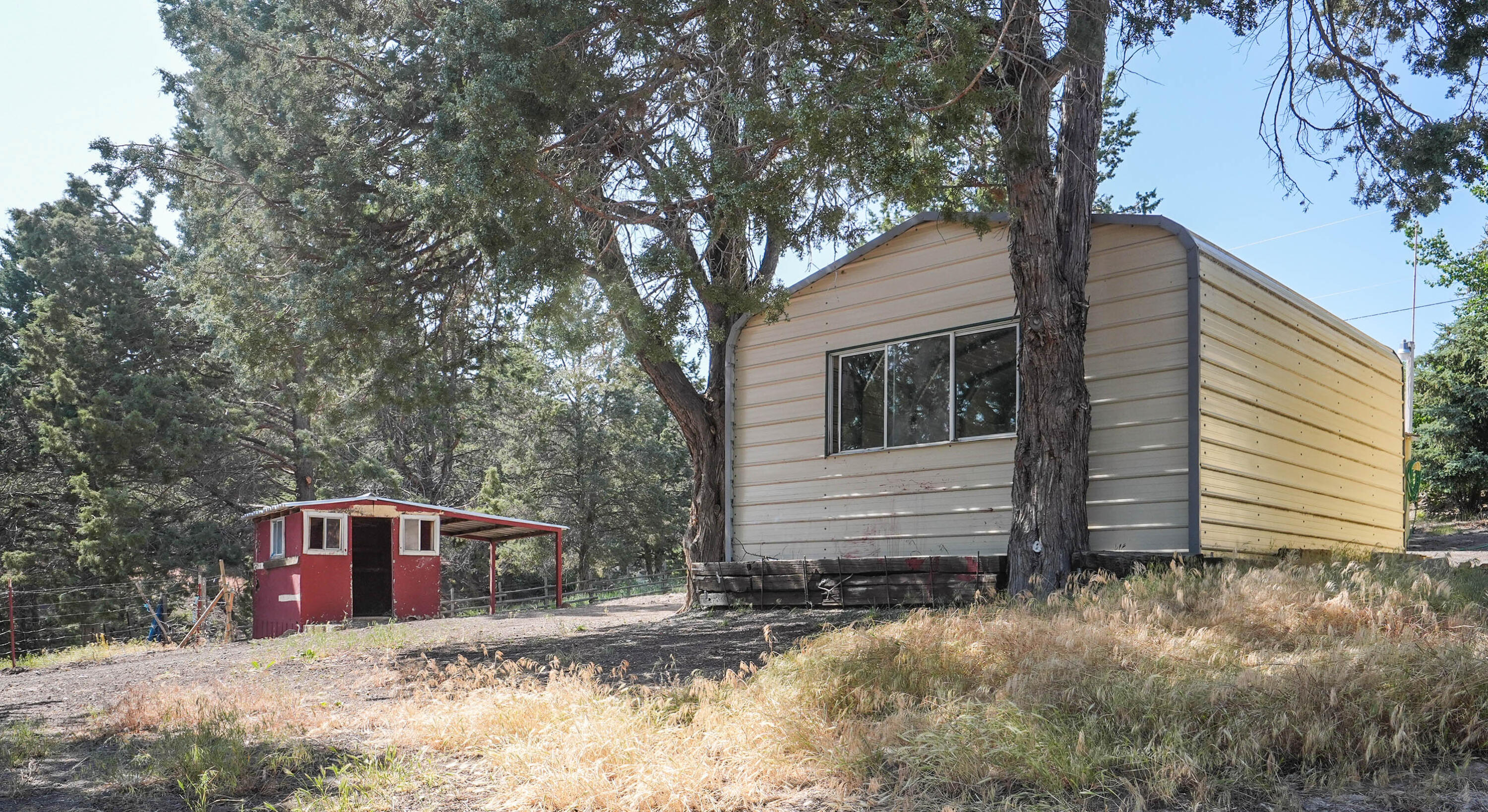 25016 Drews Road Chiloquin, OR 97624 - Photo 44 of 54 a front view of a house with yard