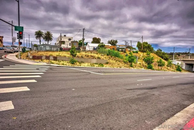 a view of a swimming pool with a yard
