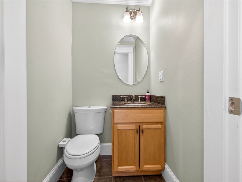 71 Parkton Road, Unit 2 Boston, MA 02130 - Photo 15 of 26 a bathroom with a toilet and a sink