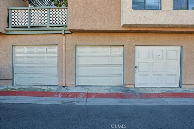 a small white building with a outdoor space