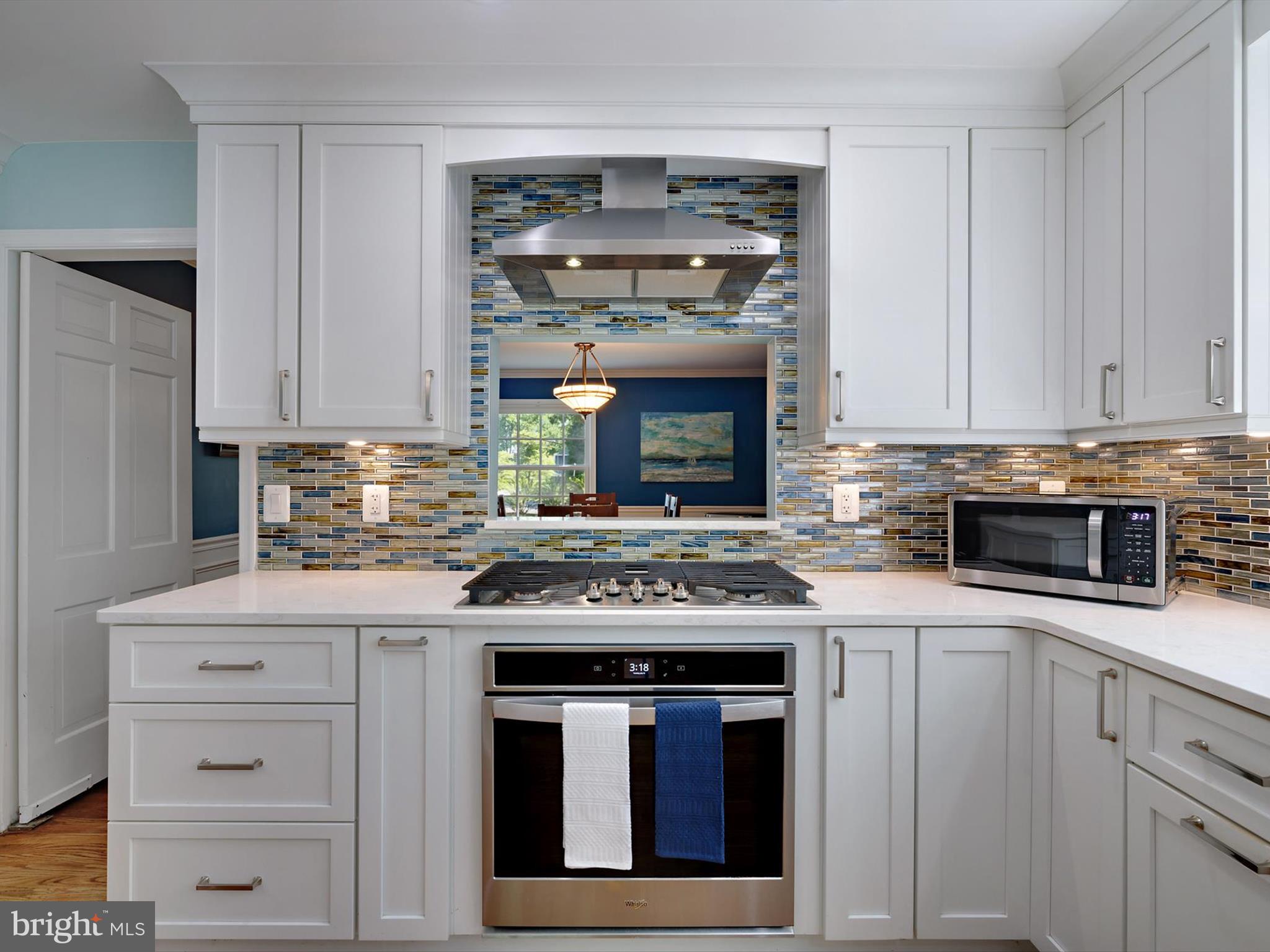 6 Brice Road Annapolis, MD 21409 - Photo 16 of 107 a kitchen with cabinets and white stove