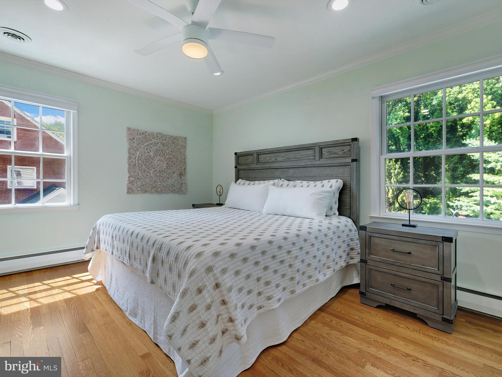 6 Brice Road Annapolis, MD 21409 - Photo 23 of 107 a bedroom with a large bed and a large window