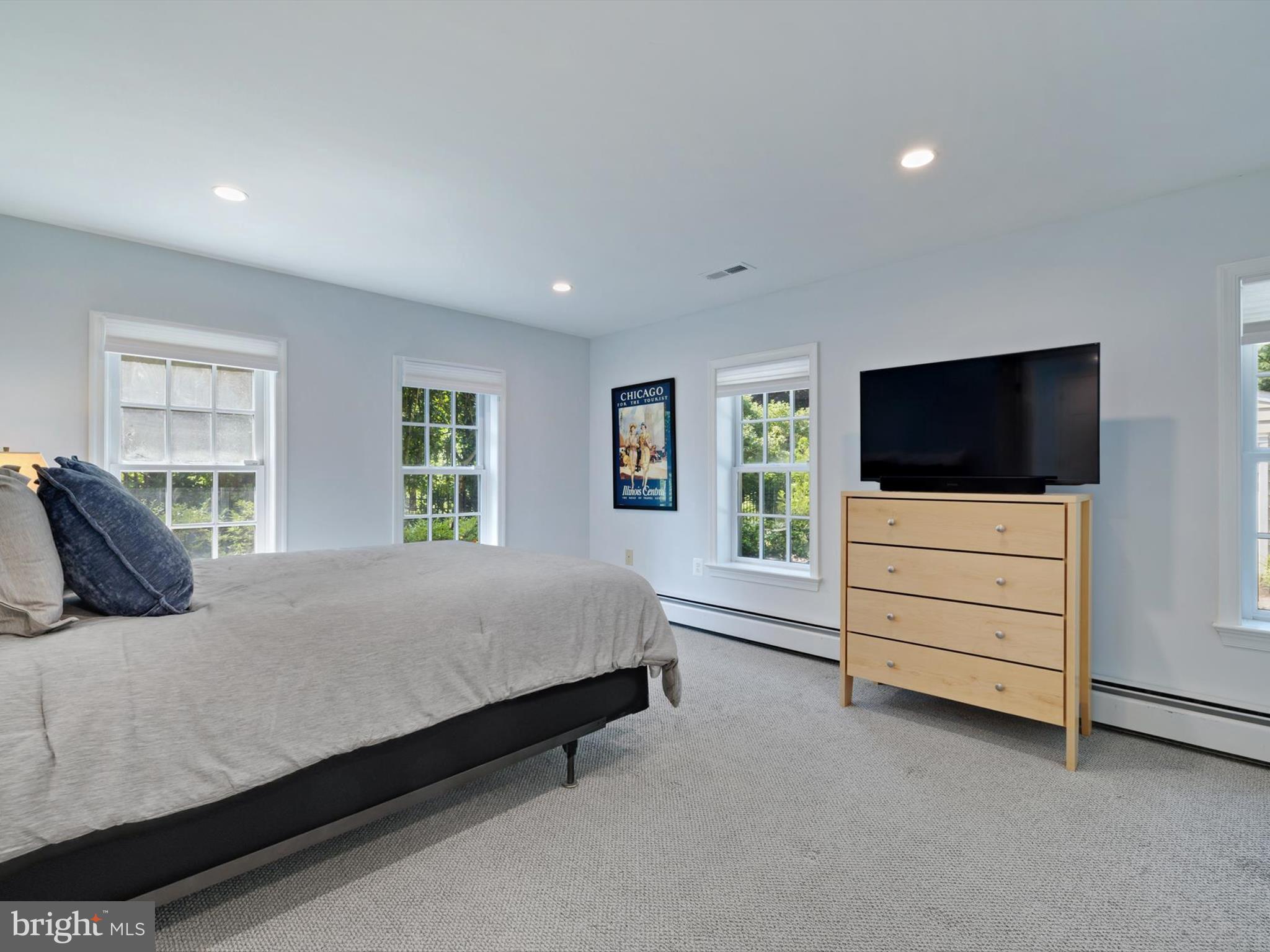 6 Brice Road Annapolis, MD 21409 - Photo 39 of 107 a bedroom with a bed and flat screen tv