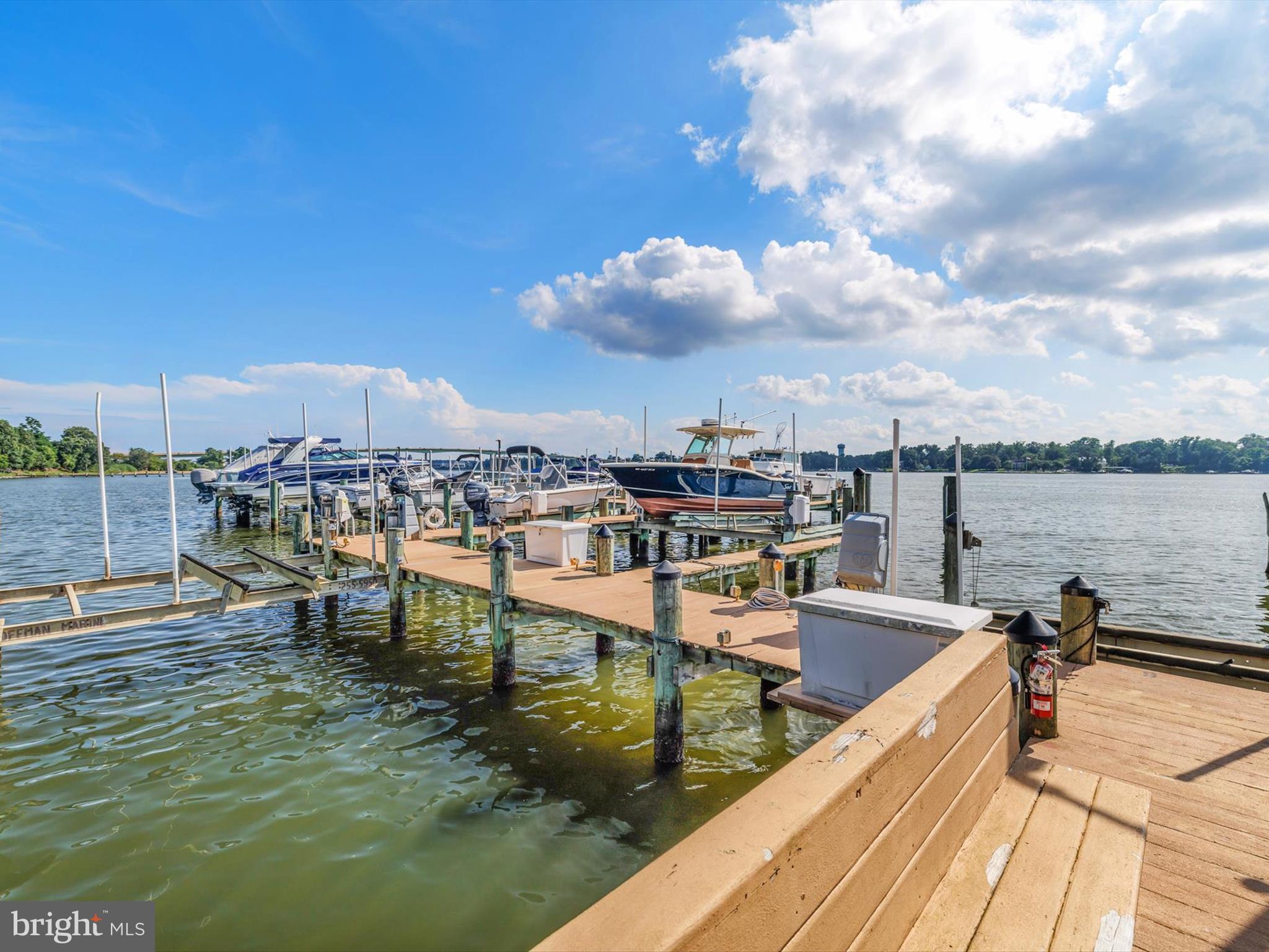 6 Brice Road Annapolis, MD 21409 - Photo 70 of 107 a view of a lake with chairs
