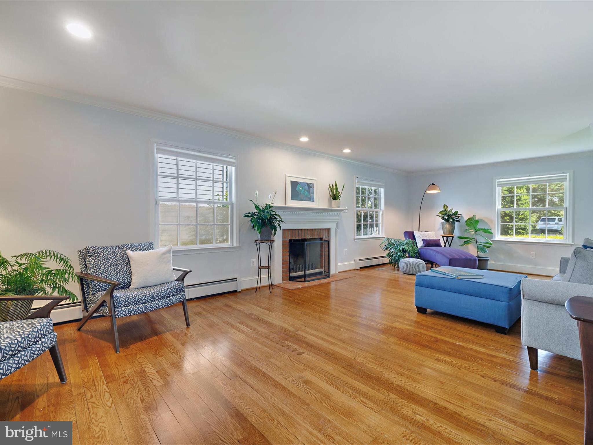 6 Brice Road Annapolis, MD 21409 - Photo 8 of 107 a living room with furniture and a fireplace