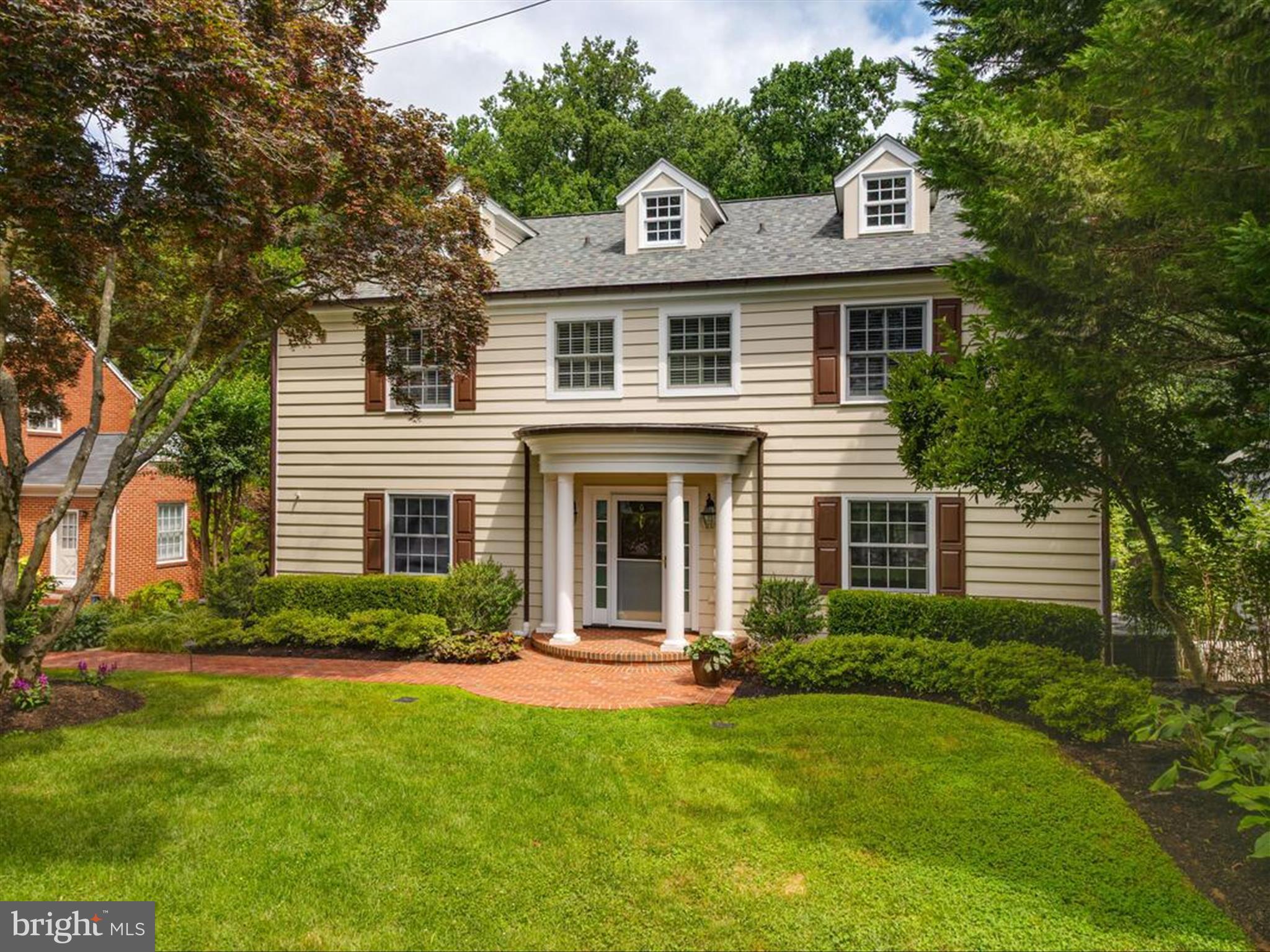 6 Brice Road Annapolis, MD 21409 - Photo 81 of 107 a front view of a house with a yard and trees