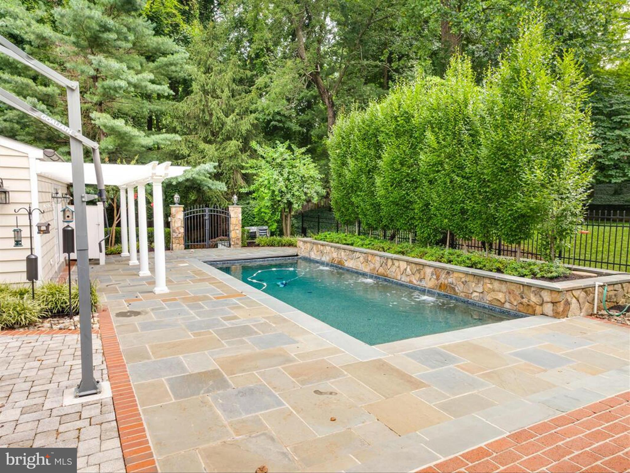 6 Brice Road Annapolis, MD 21409 - Photo 84 of 107 a view of a swimming pool with a patio
