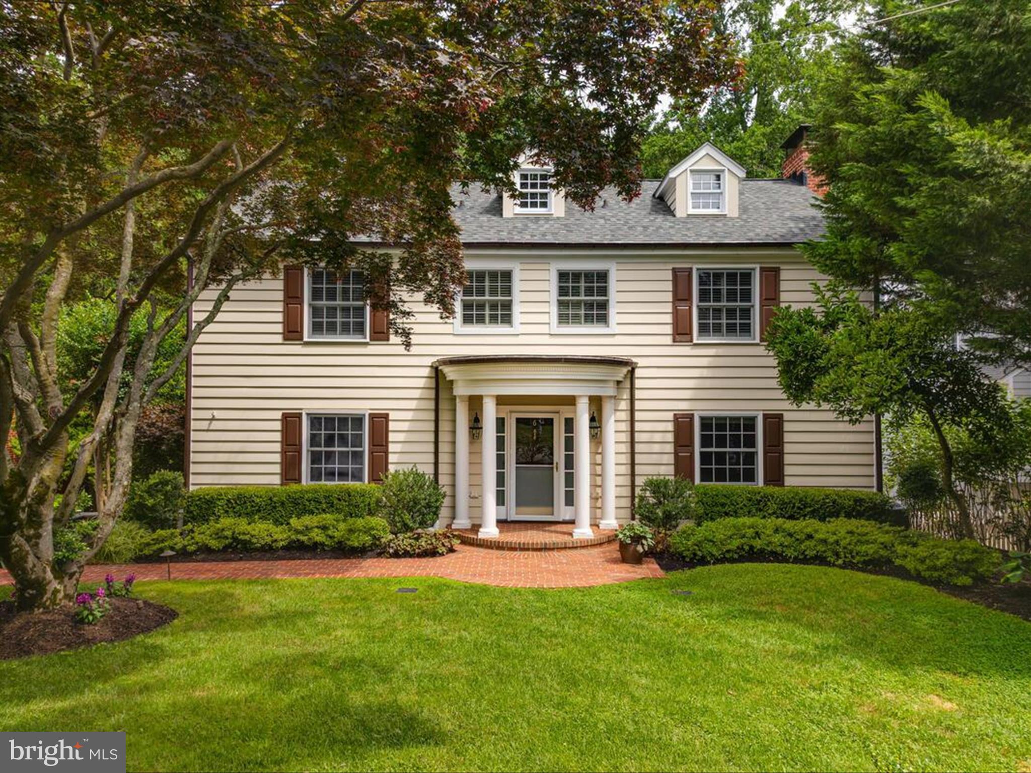 6 Brice Road Annapolis, MD 21409 - Photo 92 of 107 a front view of a house with a yard and garage