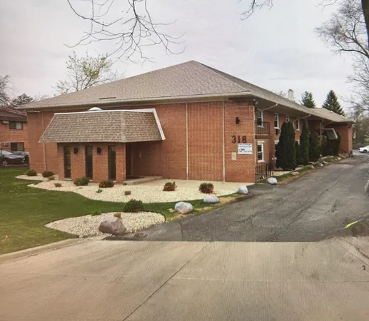 a front view of house with yard