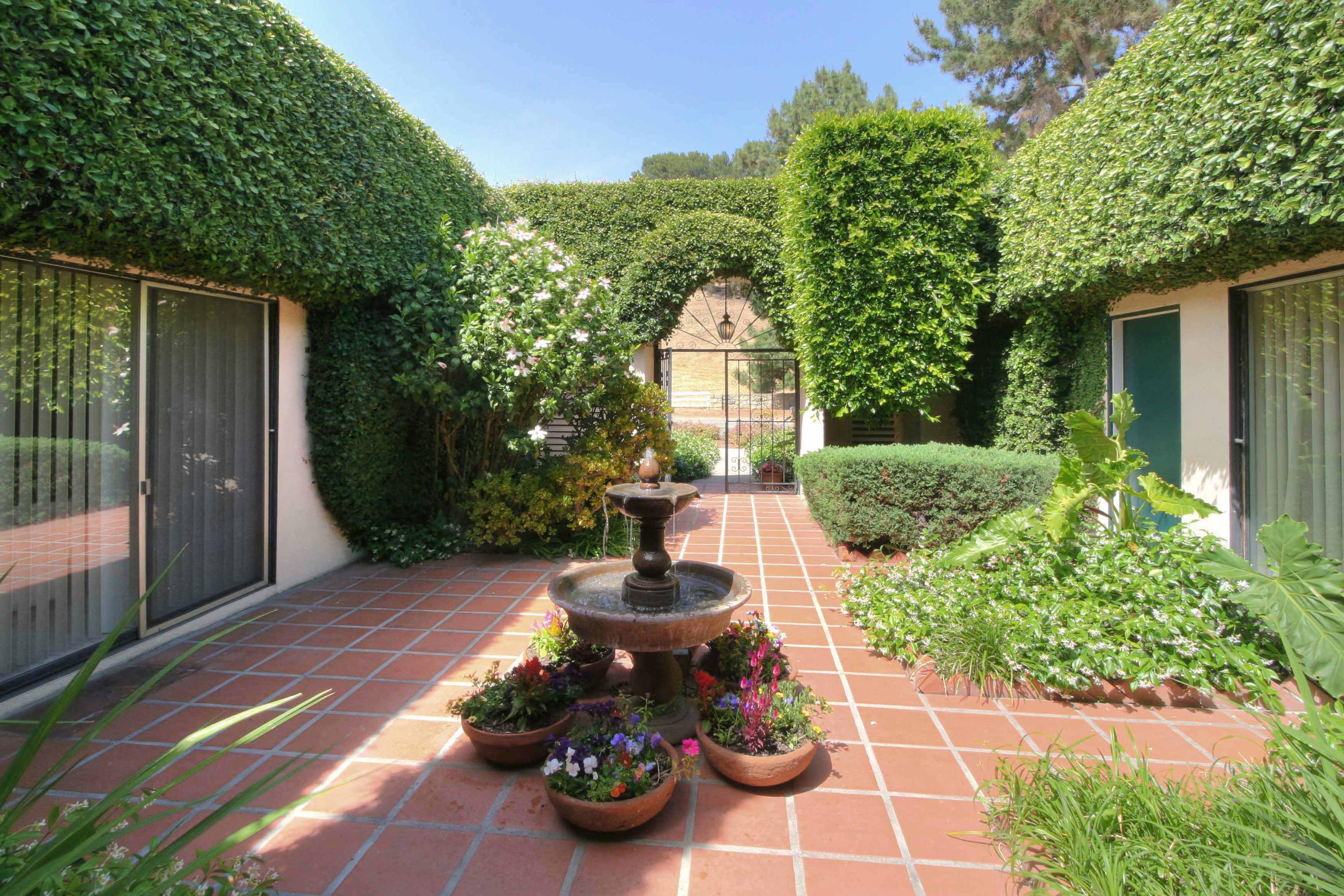 3739 Foothill Road Santa Barbara, CA 93105 - Photo 1 of 20 8102_CourtyardFromFrontDoor-72dpiRESZ