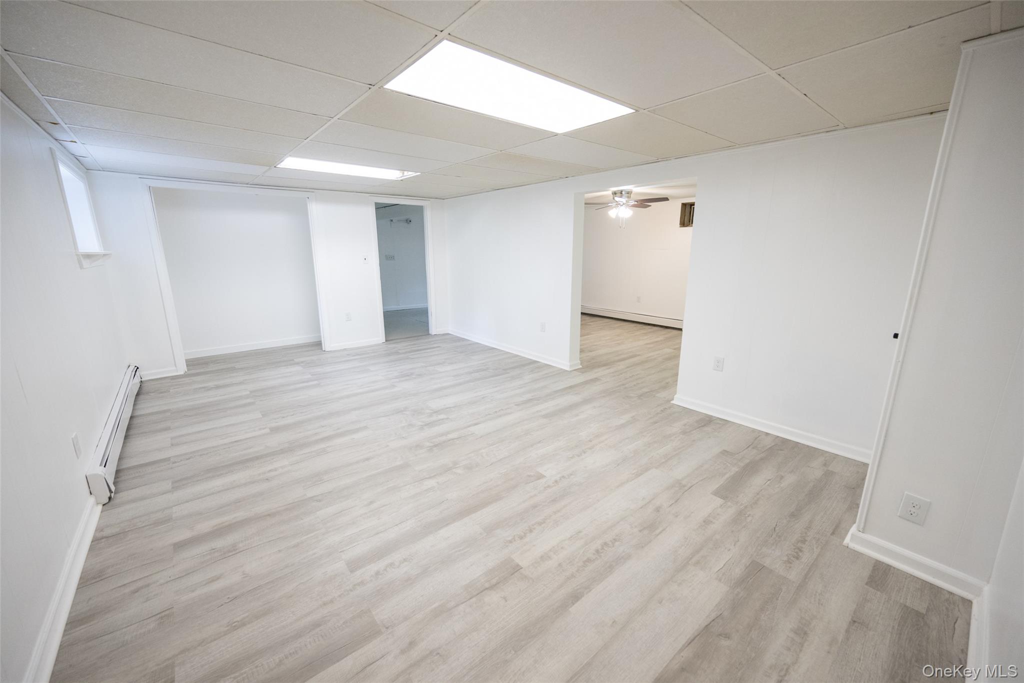 136 Foggintown Road Brewster, NY 10509 - Photo 39 of 50 a view of an empty room with wooden floor