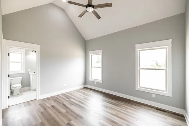 a front view of a house with a large window